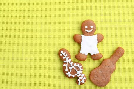 Music creative concept with gingerbread man, guitar and treble clefの写真素材