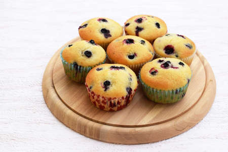Summer baking - delicious homemade muffins with black currantの写真素材
