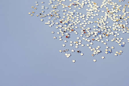Festive background with small glittering stars, copy space for textの写真素材