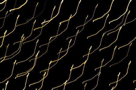 Festive abstract background with Christmas lights. Motion, contrast, light effect