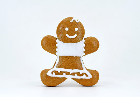 Smiling gingerbread woman on white backgroundの写真素材