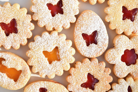 Linzer cookies filled with strawberry and apricot jam. Easter baking