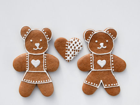 Gingerbread bears and heart decorated with white icingの写真素材
