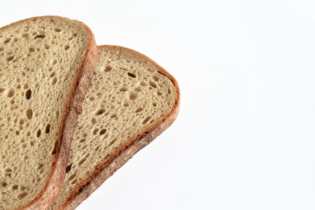 Two slices of bread on a white background, copy space for text
