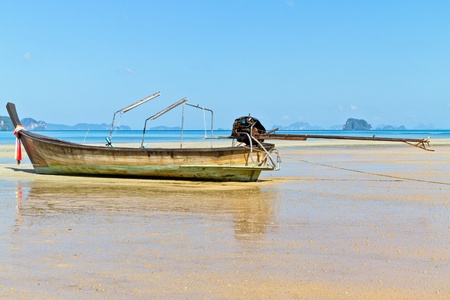 long tail boat on the beach の写真素材
