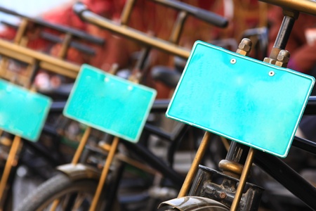 green plate on the bicycle 
