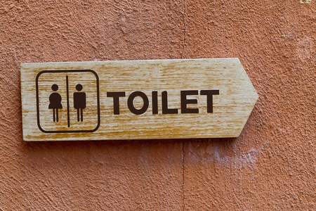toilet sign on vintage wallの写真素材