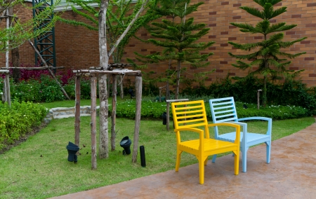 two wooden chairs in garden の写真素材
