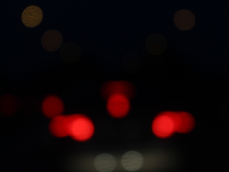 Colorful circles of light blur , bokeh and abstract with defocused  black backgroundの写真素材