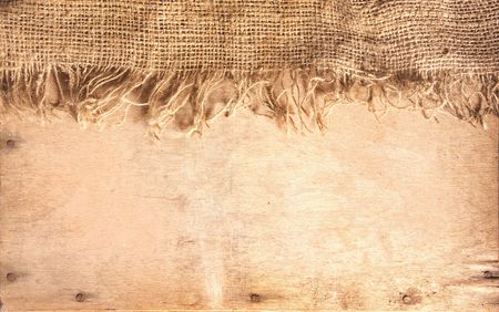 hemp textile on wood texture shot from above with copy space for textの写真素材