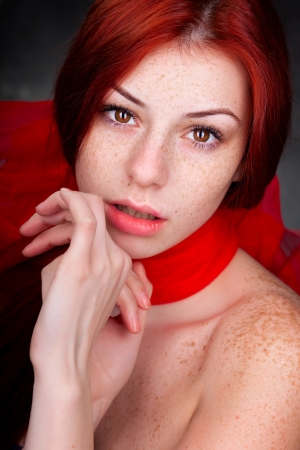 beautiful woman portrait with red hair and frecklesの写真素材
