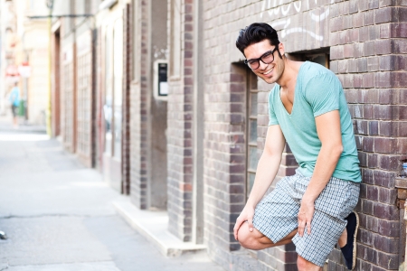 handsome man smiling on the streetの写真素材