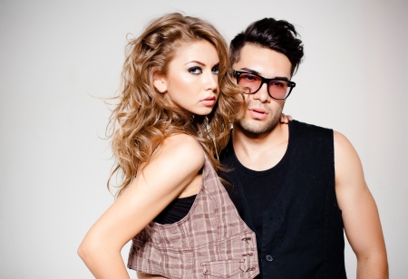 Sexy man and woman doing a fashion photo shootの写真素材