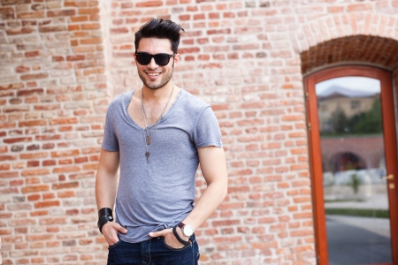 attractive young male model smilingの写真素材