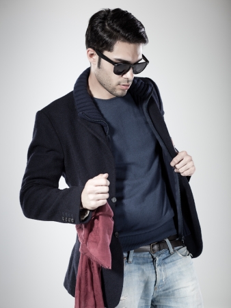 attractive man posing in the studioの写真素材