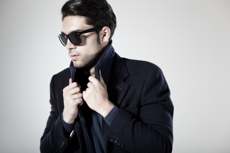 attractive man posing in the studioの写真素材
