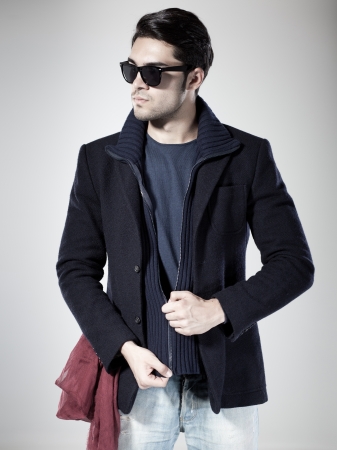 attractive man posing in the studioの写真素材