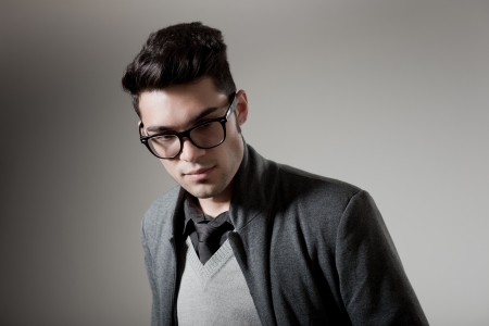 attractive man dressed casual wearing glasses - studio shot, copy spaceの写真素材