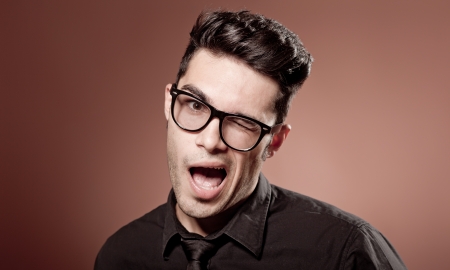 attractive man dressed casual wearing glasses - studio shot, copy spaceの写真素材