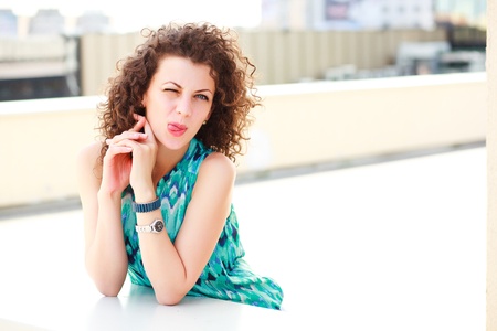 attractive women making a funny face outdoor on a sunny dayの写真素材