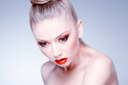 beauty shot of beautiful blonde woman wearing professional make-up on の写真素材