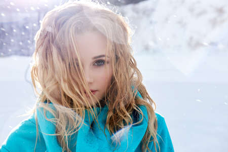 Portrait of young woman against of white backgroundの写真素材