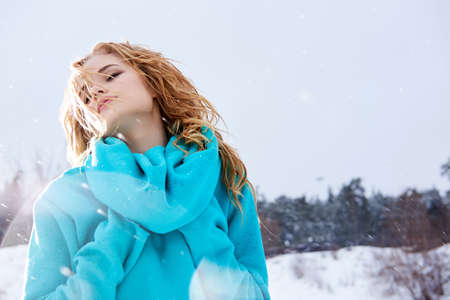 Portrait of young woman against of white backgroundの写真素材