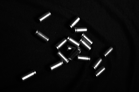 Bullet shells on a black background