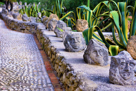 Enchanted castle work of the sculptor Filippo Bentivegna who for over 50 years has carved faces and heads in stones September 18 2019 Sciacca Sicilyのeditorial素材