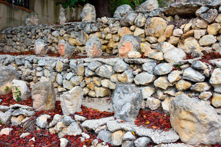 Enchanted castle work of the sculptor Filippo Bentivegna who for over 50 years has carved faces and heads in stones September 18 2019 Sciacca Sicilyのeditorial素材