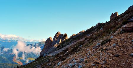 jumps towards the refuge path tower of Pisa latemar (predazzo pampeago) dolomites autonomous province of Bolzano Italyの写真素材