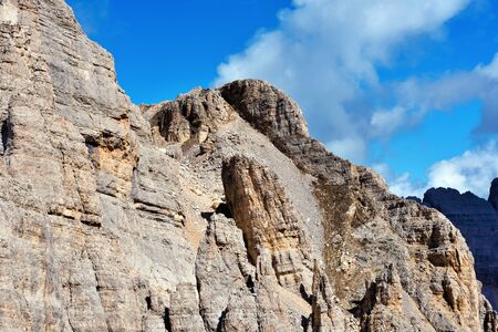 jumps towards the refuge path tower of Pisa latemar (predazzo pampeago) dolomites autonomous province of Bolzano Italyの写真素材