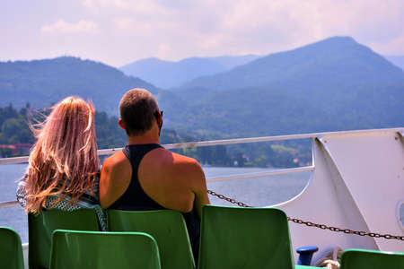 couple of tourists on the ferry lake como italyのeditorial素材