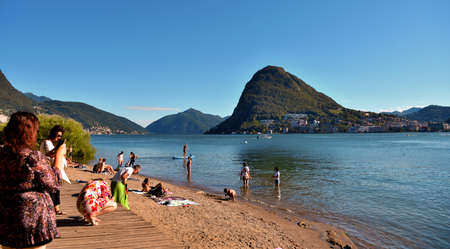 bathing in the Parco Ciani. Beach on Lake Lugano July 11, 2020 Lugano Switzerlandのeditorial素材