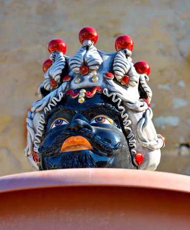 ceramic masks by anonymous artists in donnalucata September 17 2018 Ragusa Italyのeditorial素材