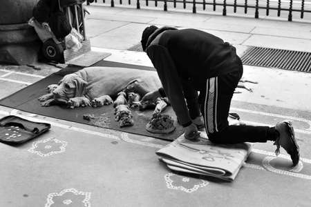 street artist makes sculptures in the sand March 24 2021 Genoa Italyのeditorial素材