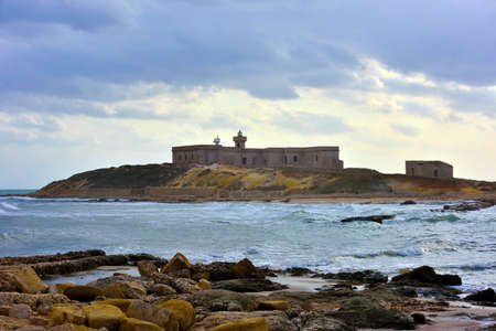 island of the currents (isola delle currents) on the Ionian coast, located in the territory of the municipality of Portopalo, syracuse sicily italyのeditorial素材