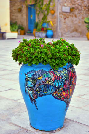 characteristic ceramic vase by an anonymous artist in the historic center of center of the village September 26 2018 Marzamemi Italyのeditorial素材