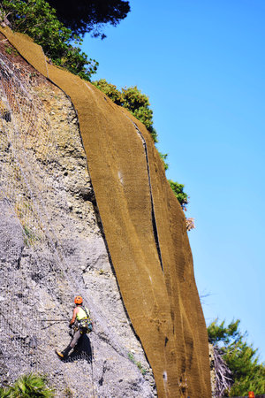 work at height, skilled worker in consortium work Genoa Italyのeditorial素材