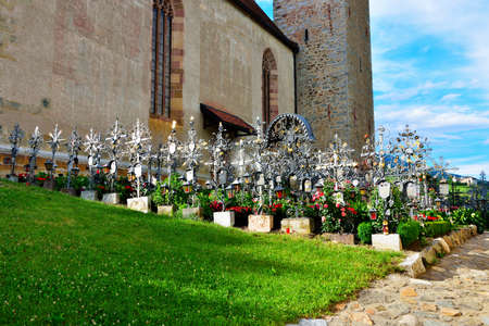 parish church of santo stefano alongside the cemetery Villandro Italyのeditorial素材