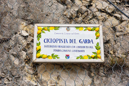 sign for tourists indicates the start of the cycle path 29 Aug 2021 Limone sul garda Italyのeditorial素材