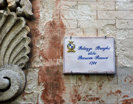 Plaque of the Bragho Palace in Baroque Rococo style 16 September 2021 Tropea Italyのeditorial素材