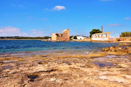 The historic Sveva Tower in Sicily in the Vendicari nature reserve near Noto and Syracuse, Italyの写真素材