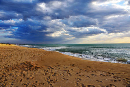 sunset over the sea in the Cava Randello Integral Nature Reserve, Scoglitti, Sicily, Italyの写真素材