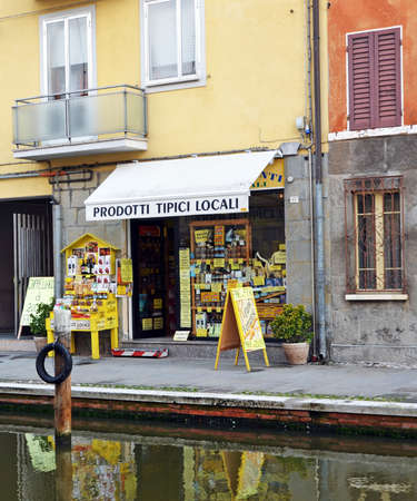 Small Italian town Comacchio also known as "The Little Venice", Emilia Romagna region, province of Ferrara, Italy: Colored houses in traditional architectural style February 10 2018 Comacchio Italyのeditorial素材