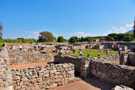 young students involved in the maintenance and cleaning of the archaeological site September 14 2018 Capaccio Paestum Italyのeditorial素材