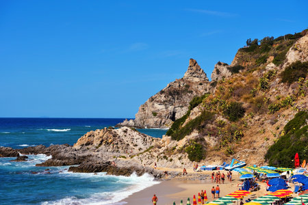 the famous grotticelle beach always crowded with bathers and tourists in the summer 18 Sep 2022 Ricadi Italyのeditorial素材