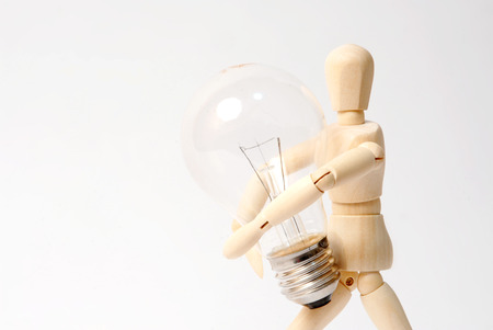 Dummy with light bulbの写真素材