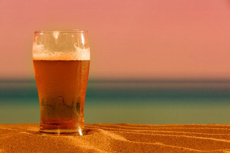 Beer on the beachの写真素材