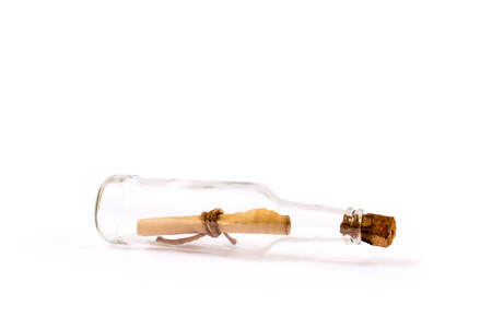 Isolated message in a bottle on white backgroundの写真素材